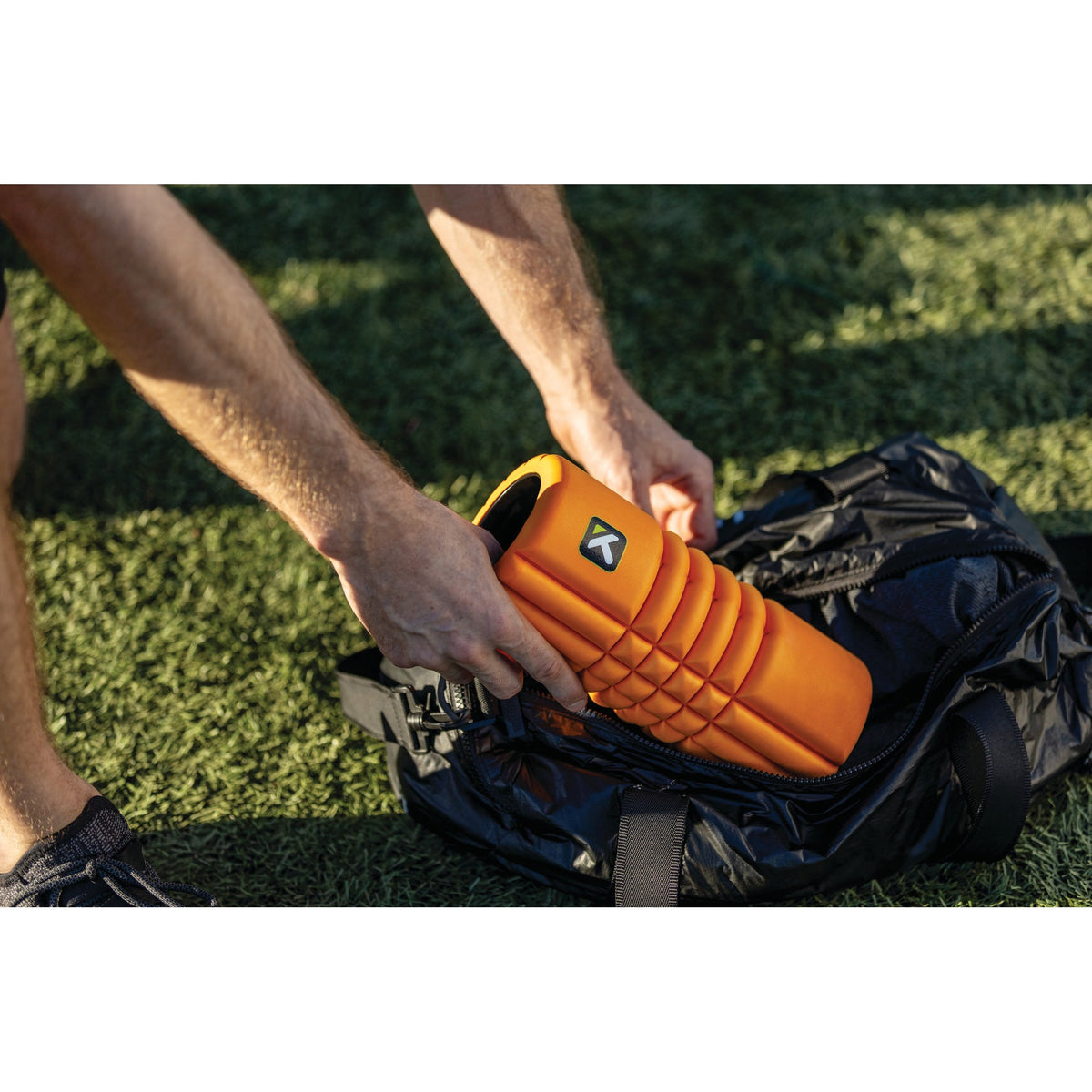 Triggerpoint Foam Roller Grid Travel - Oranje/Zwart - Sfeerafbeelding