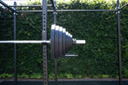 Muscle Power Olympische Halterschijf met Handgrepen - Rubber - 2,5 kg - In gebruik